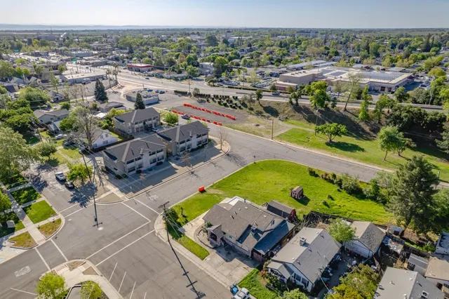 an aerial view of a house with a ocean view