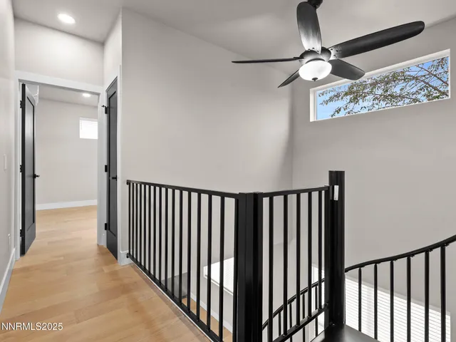 a view of a hallway with a chandelier