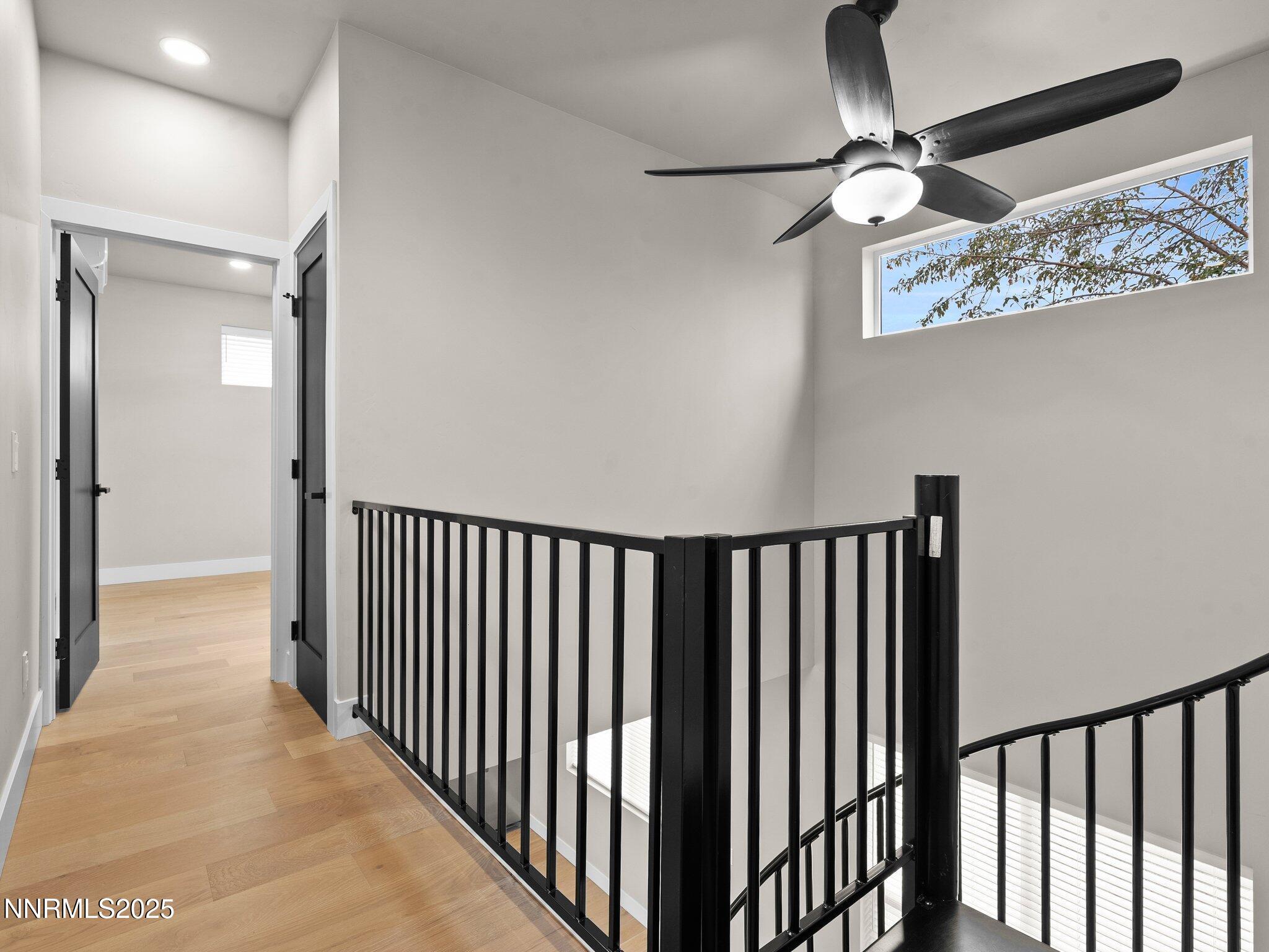1844 H Street, Unit 1 Sparks, NV 89431 - Photo 9 of 14 a view of a hallway with a chandelier