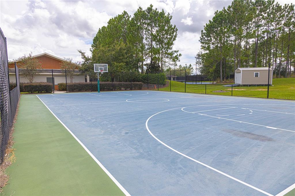 8741 Southwest 61st Loop Ocala, FL 34481 - Photo 48 of 60 a view of a tennis court