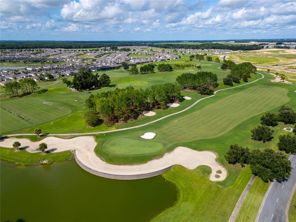 8741 Southwest 61st Loop Ocala, FL 34481 - Photo 57 of 60 a view of a lake from a balcony