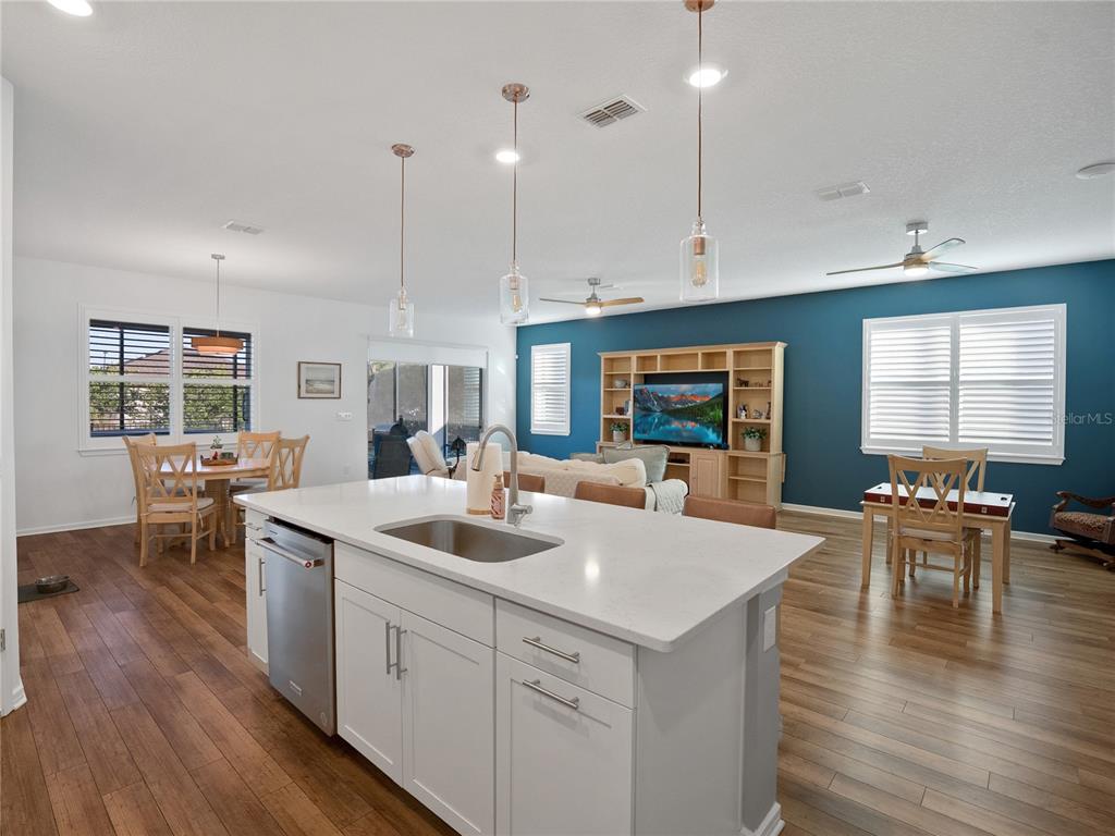 8741 Southwest 61st Loop Ocala, FL 34481 - Photo 6 of 60 a kitchen with counter space dining table and chairs
