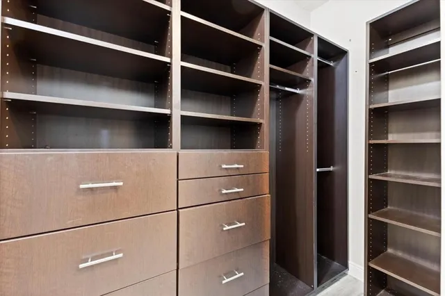 a spacious bathroom with a double vanity sink mirror and