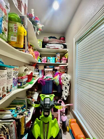 a bathroom with a sink a mirror and a shower