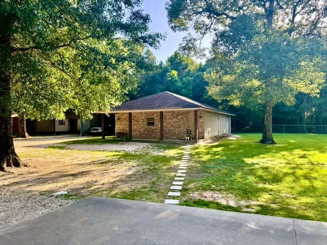 a view of yard with seating space