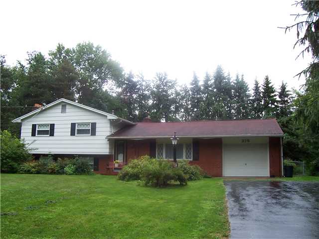 275 Martin Road Henrietta, NY 14586 - Photo 1 of 1 Exterior Front. Split level with large front yard.