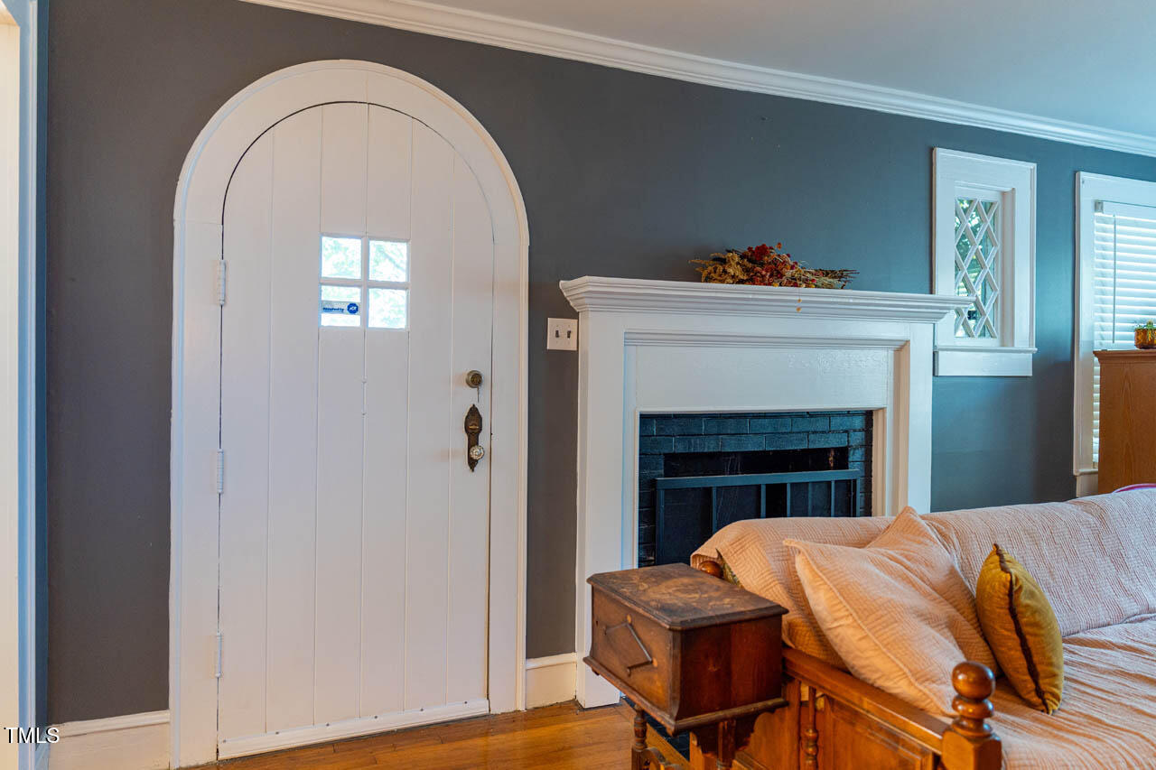 602 Roxboro Road Haw River, NC 27258 - Photo 12 of 28 Front door and gas log fireplace