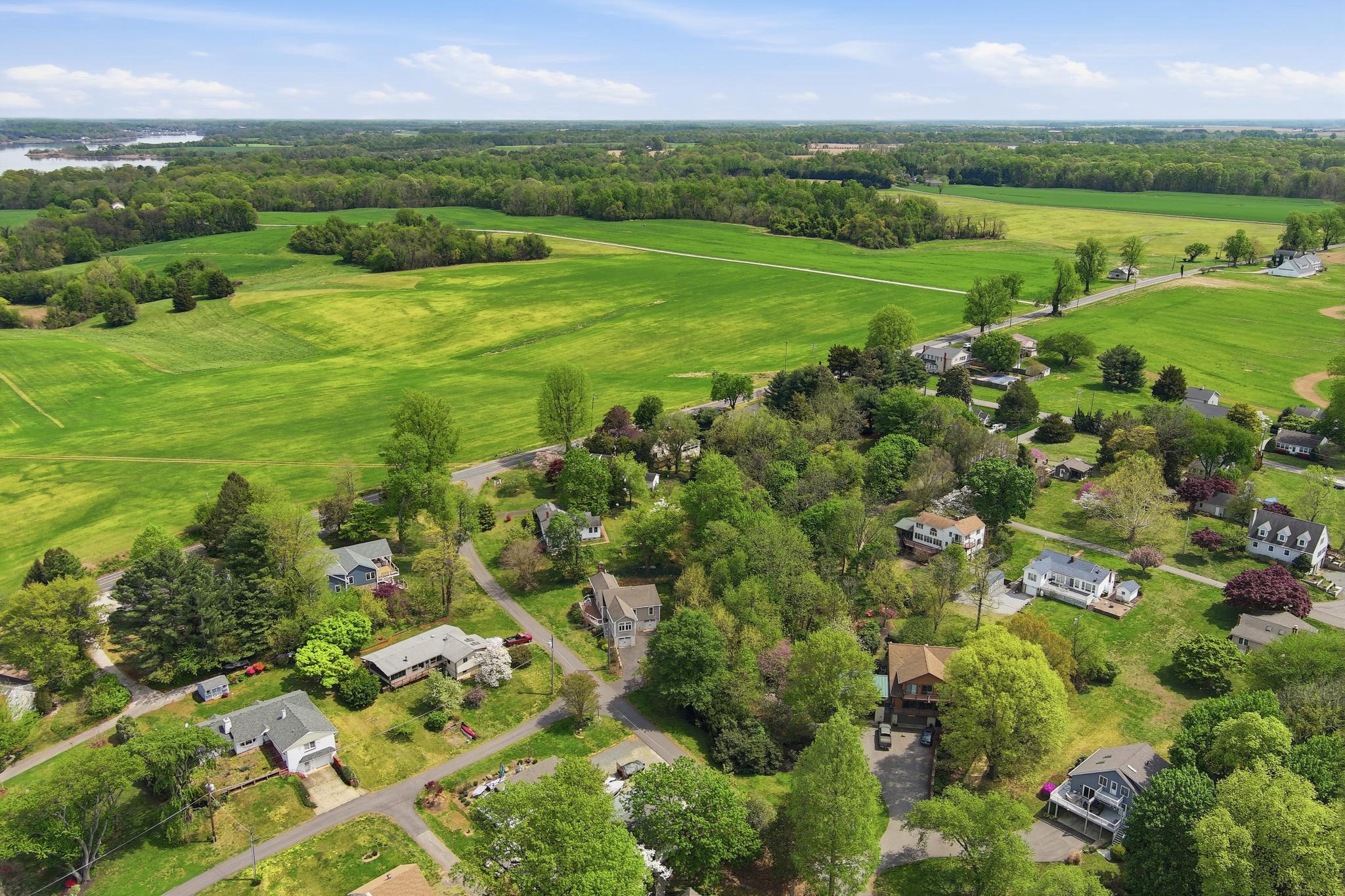 14136 Kentmore Park Road Kennedyville, MD 21645 - Photo 48 of 54 a view of a city with lush green forest