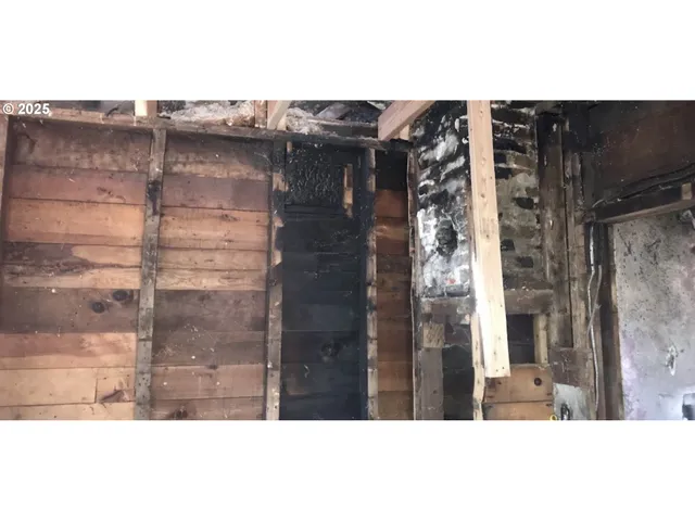 a picture of a bathroom with a shower