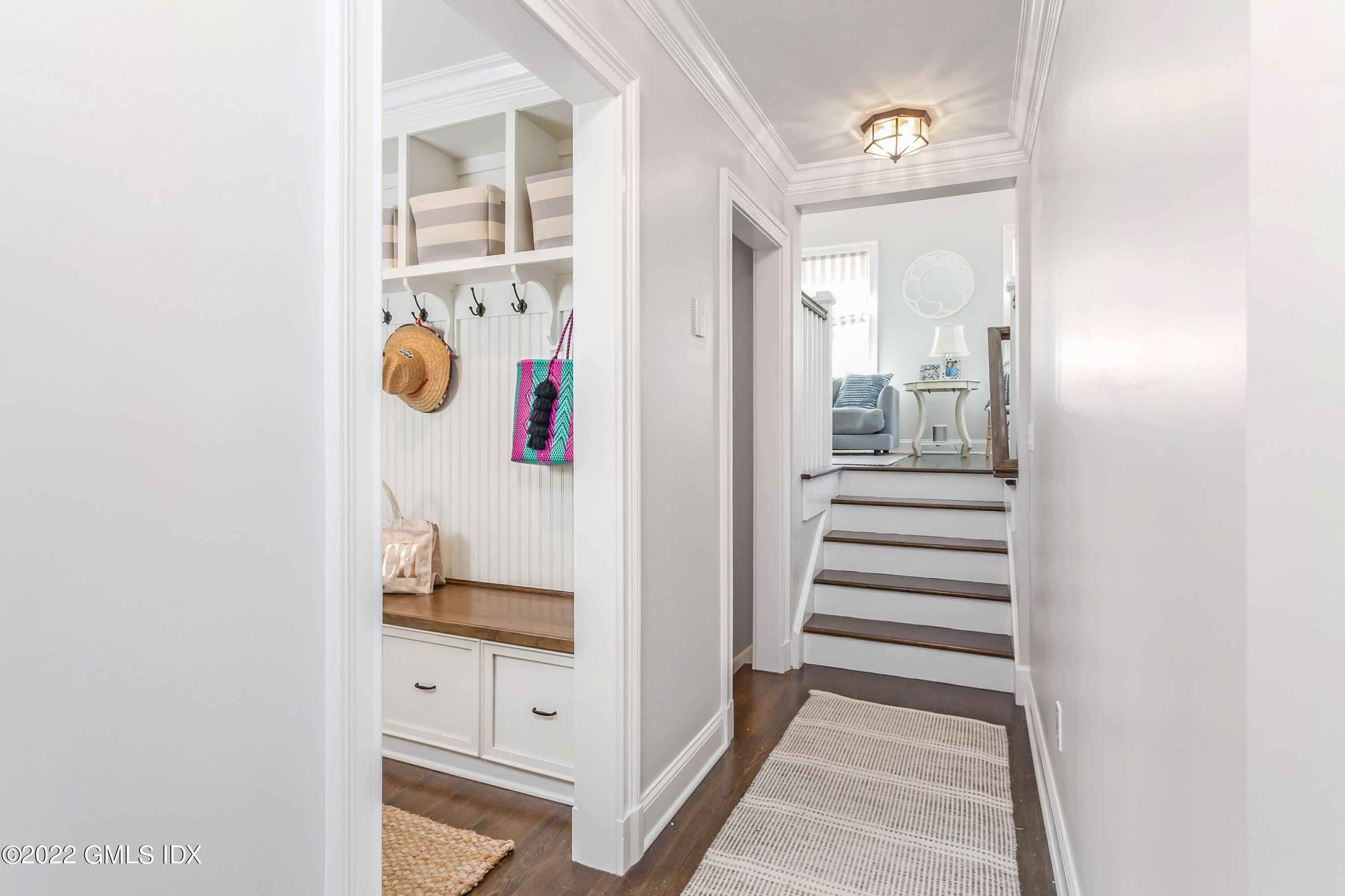 15 Dialstone Lane Riverside, CT 06878 - Photo 11 of 33 a view of a hallway with wooden floor and entryway