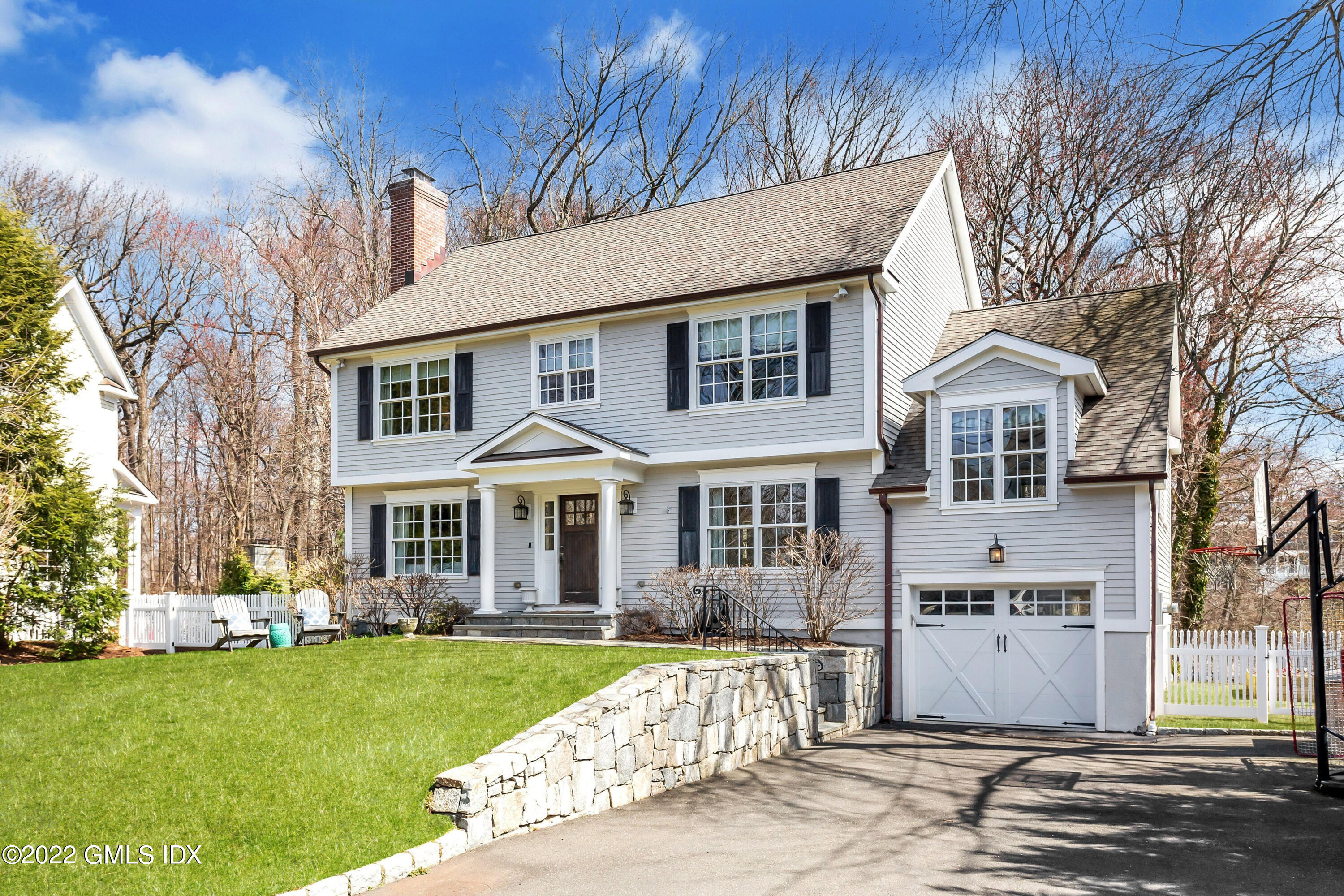 15 Dialstone Lane Riverside, CT 06878 - Photo 2 of 33 a front view of a house with a yard