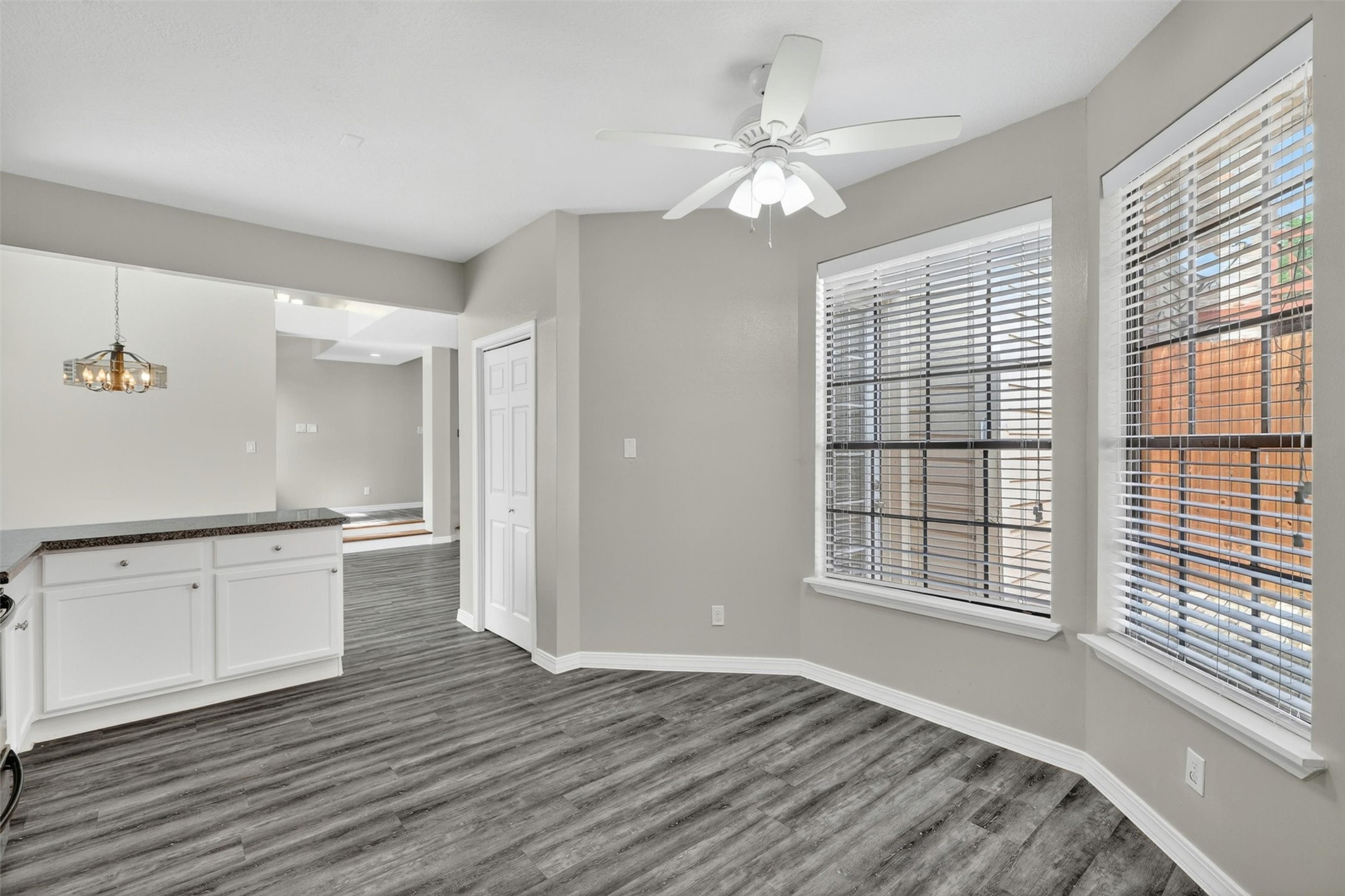 12929 Kingsbridge Lane Houston, TX 77077 - Photo 15 of 42 Bright and inviting breakfast area featuring oversized windows that flood the space with beautiful natural light and create an open, airy atmosphere buyers love. The expansive window design enhances the home’s spacious feel while offering peaceful views and a warm welcoming ambiance. Perfect for morning coffee, casual dining, or entertaining, this space seamlessly connects to the kitchen and main living areas.