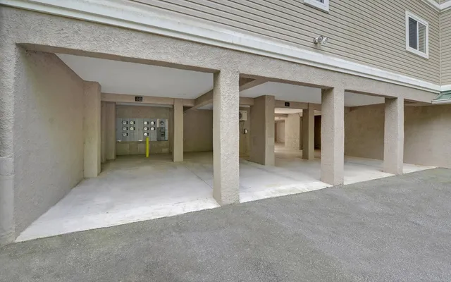 front view of a hallway with wooden shelves