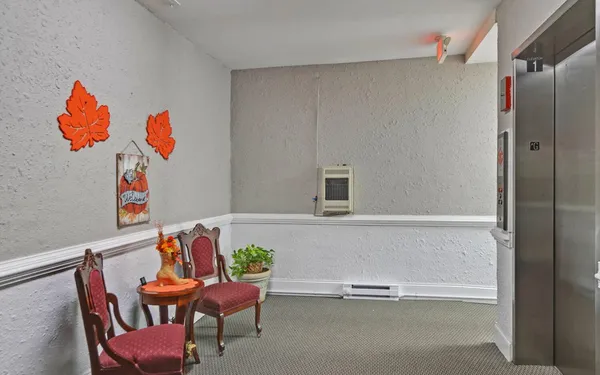 a room with a table and a chair