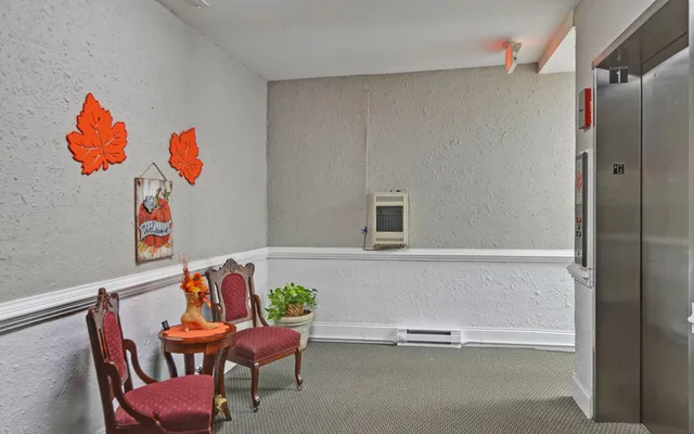 a room with a table and a chair