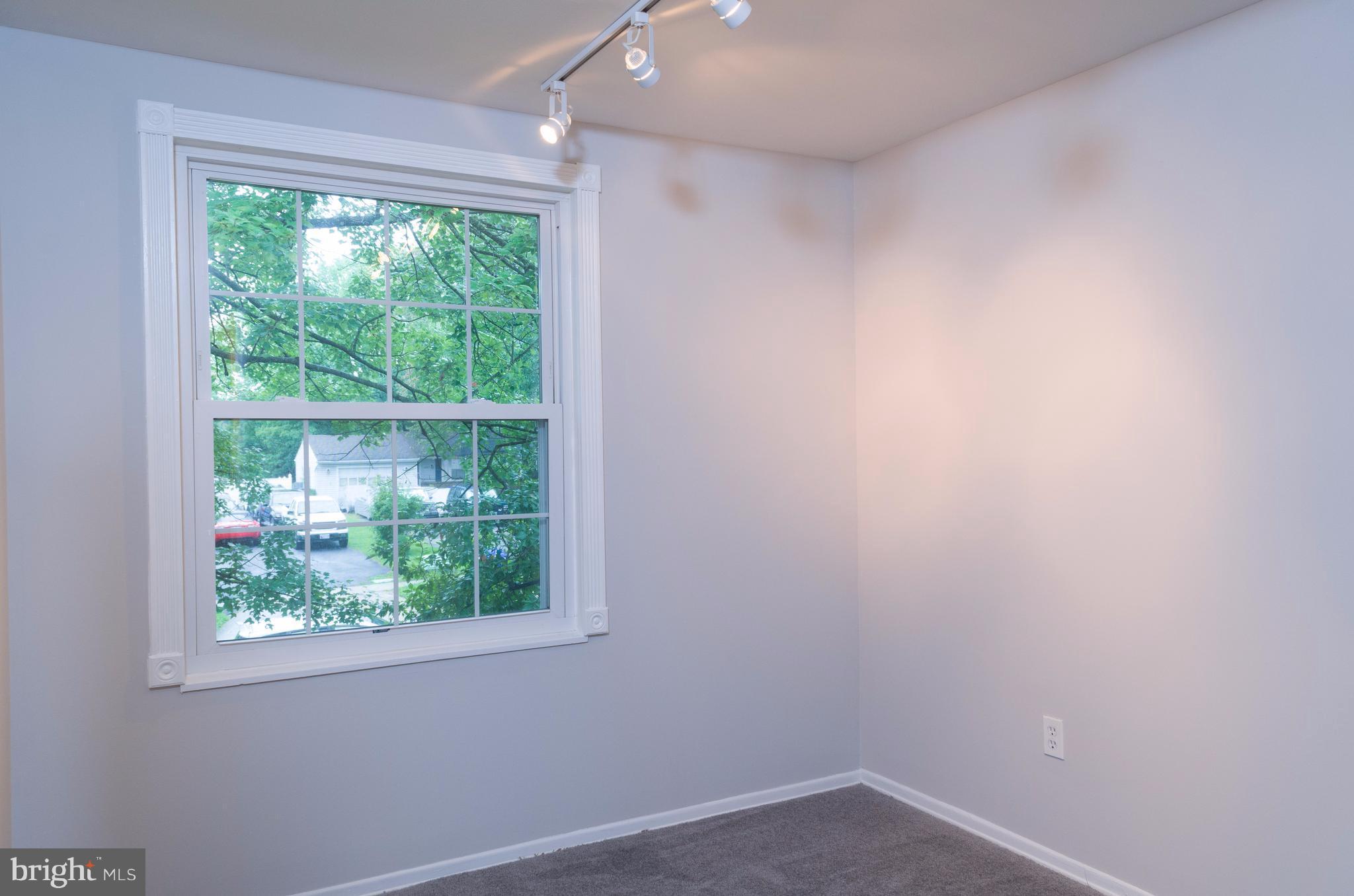 19117 Staleybridge Road Germantown, MD 20876 - Photo 14 of 19 an empty room with a window