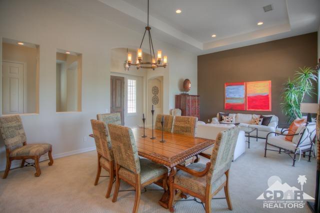 374 Loch Lomond Road Rancho Mirage, CA 92270 - Photo 14 of 38 a view of a dining room with furniture