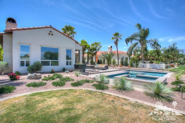 374 Loch Lomond Road Rancho Mirage, CA 92270 - Photo 33 of 38 a view of a house with backyard and sitting area