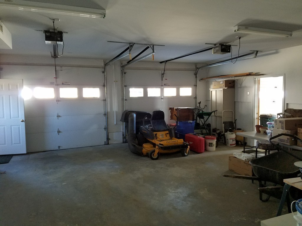 52 School House Road Groton, MA 01450 - Photo 15 of 27 a view of a room with gym equipment