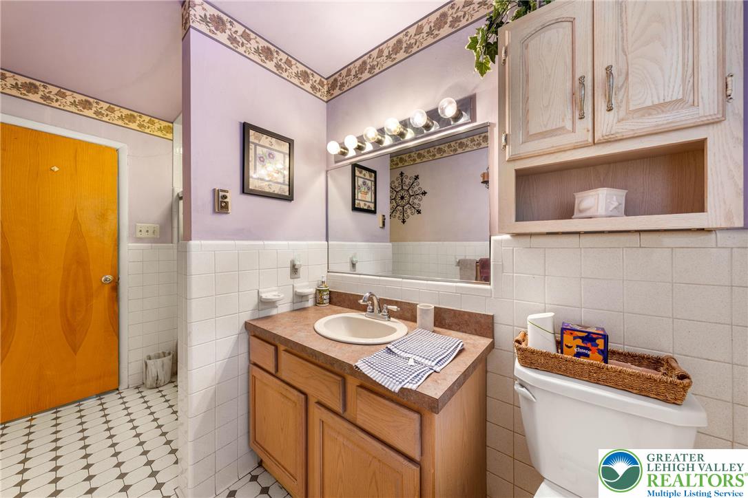 1471 State Road Coopersburg, PA 18036 - Photo 26 of 73 a bathroom with a sink and a mirror