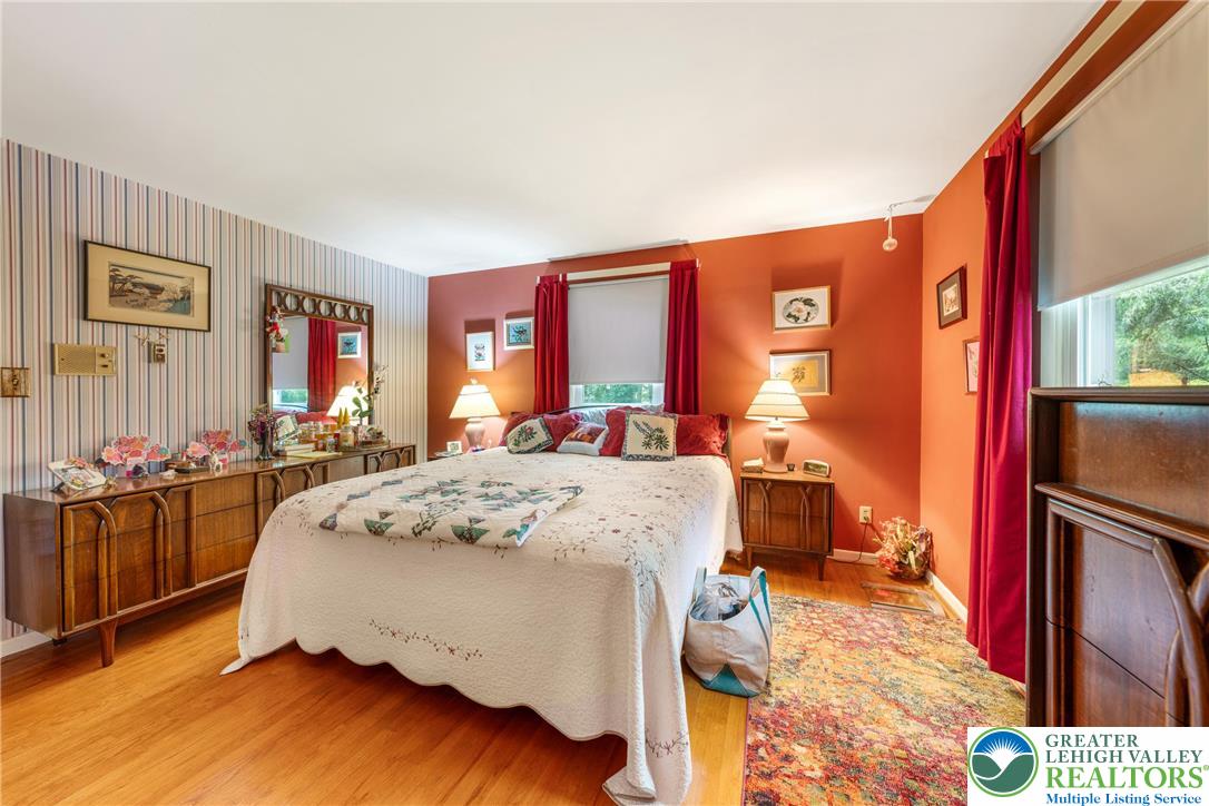 1471 State Road Coopersburg, PA 18036 - Photo 30 of 73 a bed room with a bed and dresser