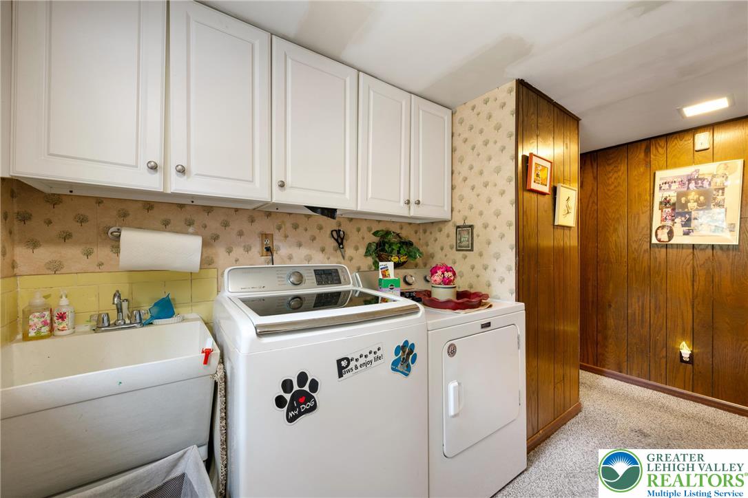 1471 State Road Coopersburg, PA 18036 - Photo 46 of 73 a utility room with sink dryer and washer