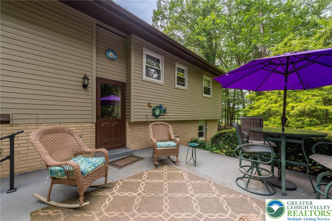 1471 State Road Coopersburg, PA 18036 - Photo 52 of 73 a patio with tables and chairs