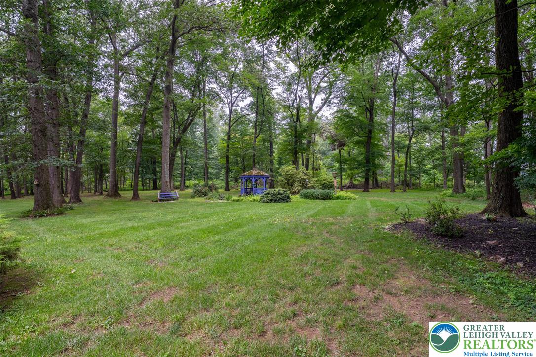 1471 State Road Coopersburg, PA 18036 - Photo 58 of 73 a childrens park with lots of swings and slides