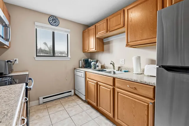 $299,900 | 70 Wylie Court, Unit 15, Conway, NH 03860