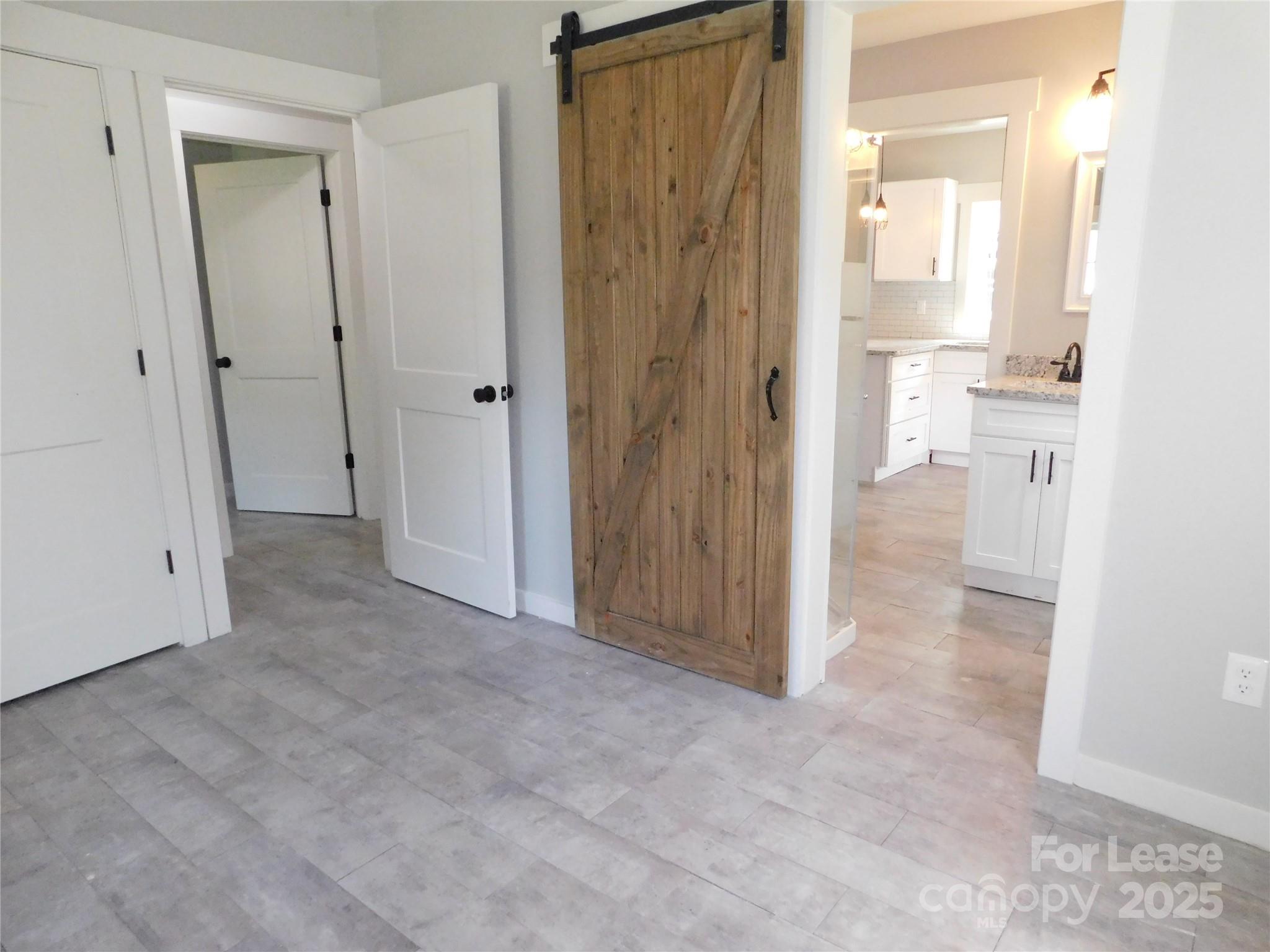 809 Marve Street Gastonia, NC 28052 - Photo 14 of 19 a view of a bathroom with a shower and a sink