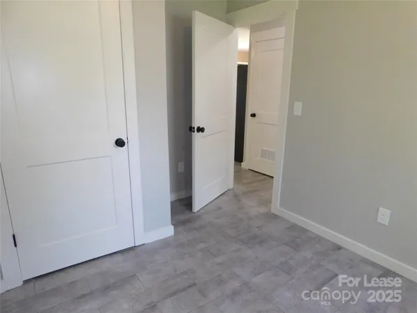 a view of a room with an empty space