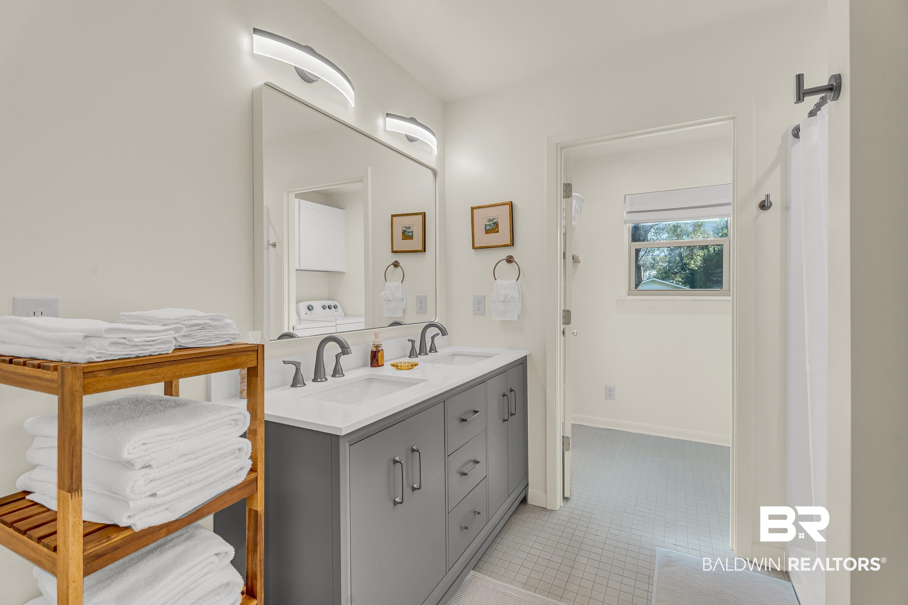 357 Azalea Street Fairhope, AL 36532 - Photo 10 of 22 Full bathroom with double vanity and washer / clothes dryer