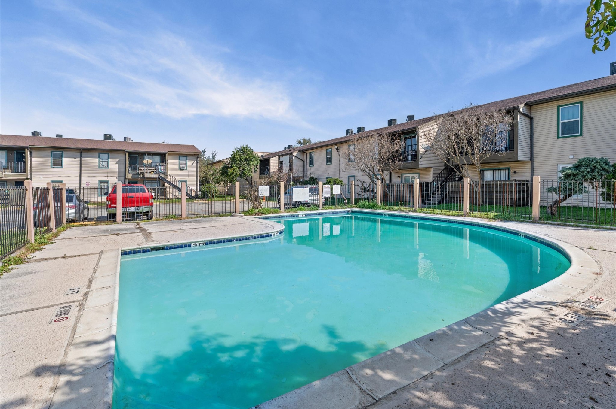 6161 Reims Road, Unit 207 Houston, TX 77036 - Photo 14 of 15 a swimming pool with outdoor seating and yard