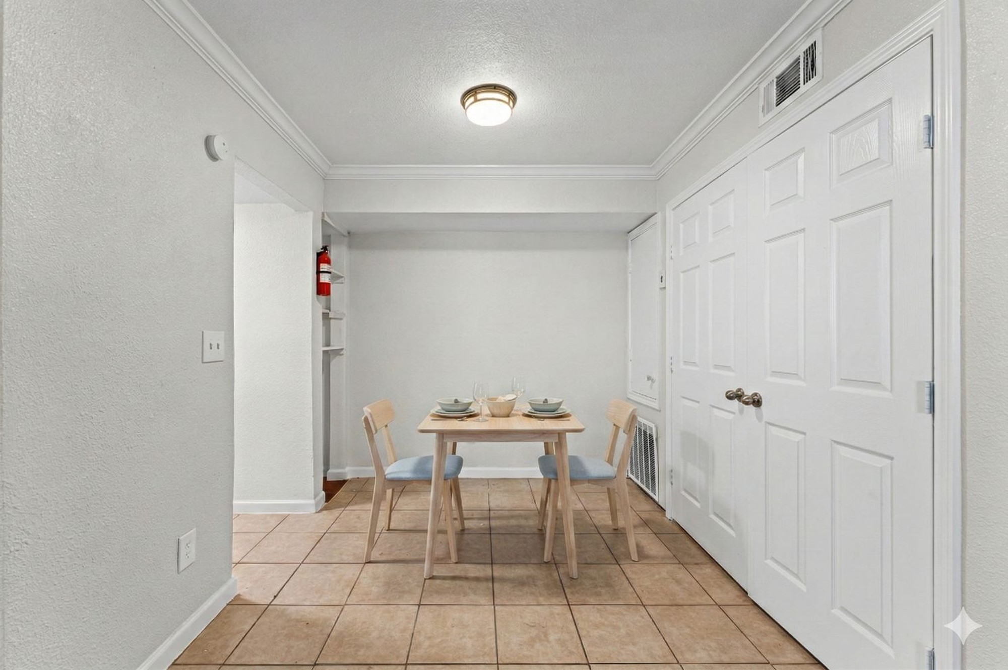 6161 Reims Road, Unit 207 Houston, TX 77036 - Photo 7 of 15 a dining room with furniture and wooden floor