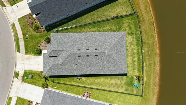 a view of swimming pool with a outdoor seating