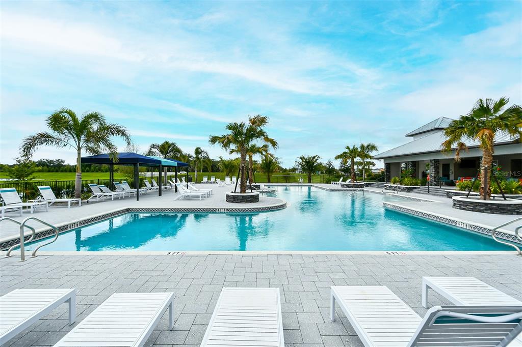11869 Richmond Trail Parrish, FL 34219 - Photo 68 of 68 a view of a swimming pool with outdoor seating