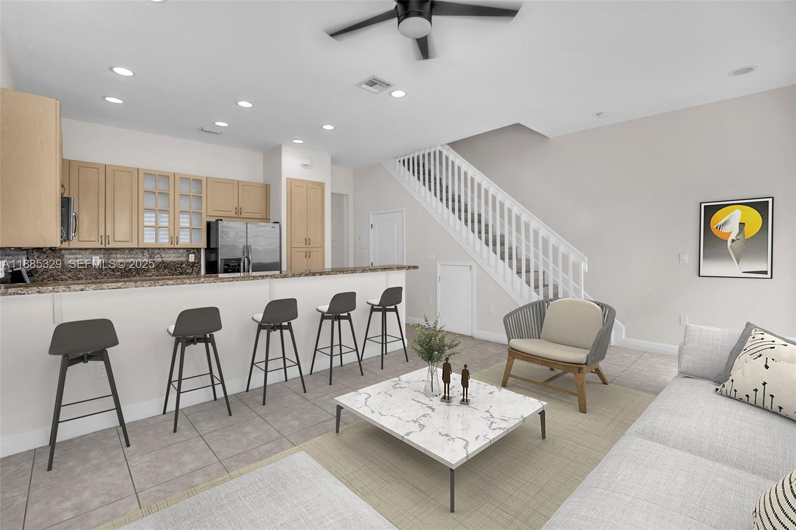 14634 Southwest 5th Street, Unit 15 Pembroke Pines, FL 33027 - Photo 17 of 56 a living room with furniture and kitchen view