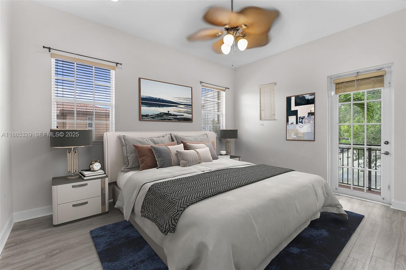 14634 Southwest 5th Street, Unit 15 Pembroke Pines, FL 33027 - Photo 23 of 56 a bedroom with a large bed and a chandelier