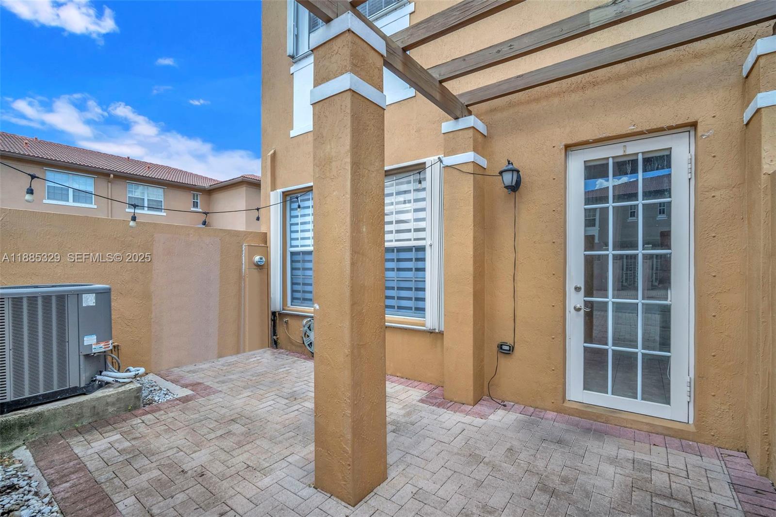 14634 Southwest 5th Street, Unit 15 Pembroke Pines, FL 33027 - Photo 28 of 56 a view of front door of house