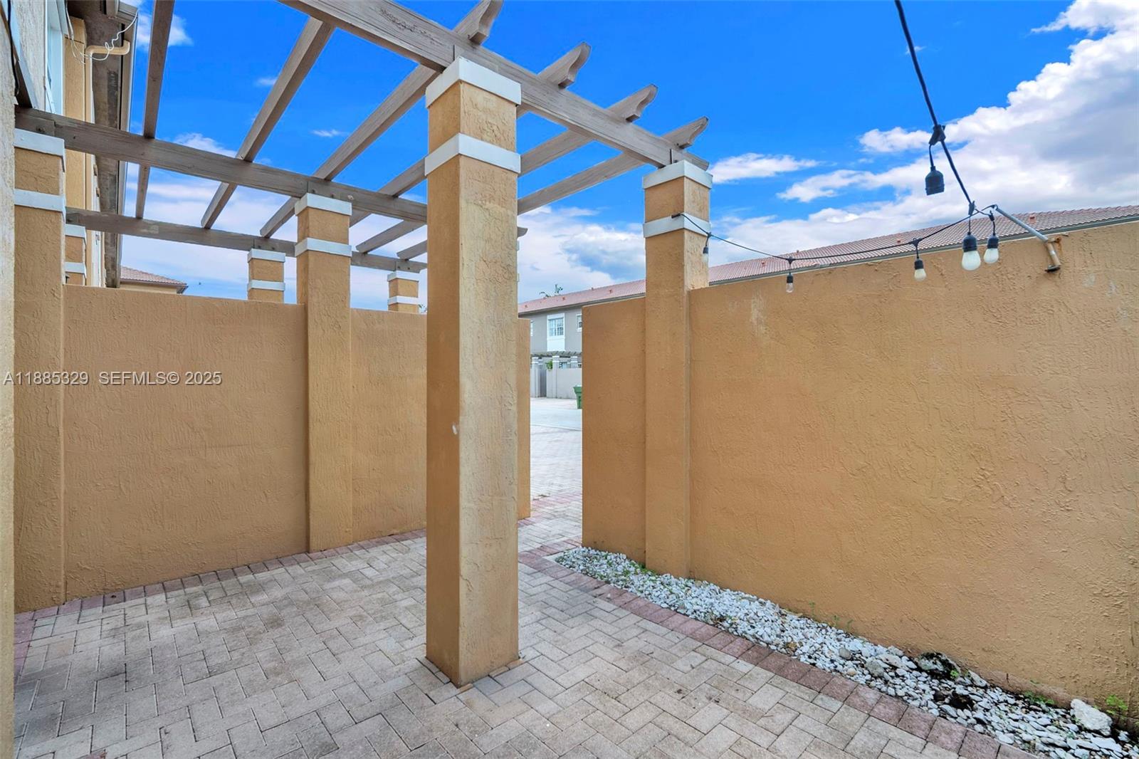 14634 Southwest 5th Street, Unit 15 Pembroke Pines, FL 33027 - Photo 29 of 56 a view of a room with a hanging space