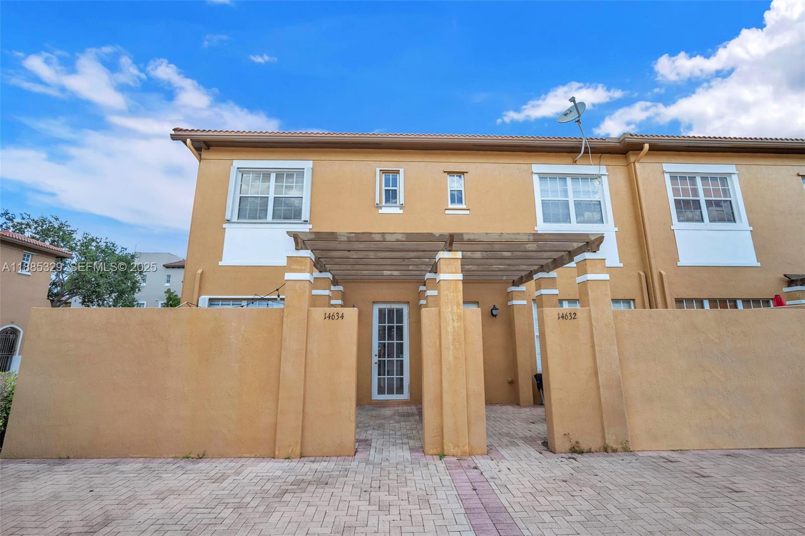 14634 Southwest 5th Street, Unit 15 Pembroke Pines, FL 33027 - Photo 32 of 56 front view of a house