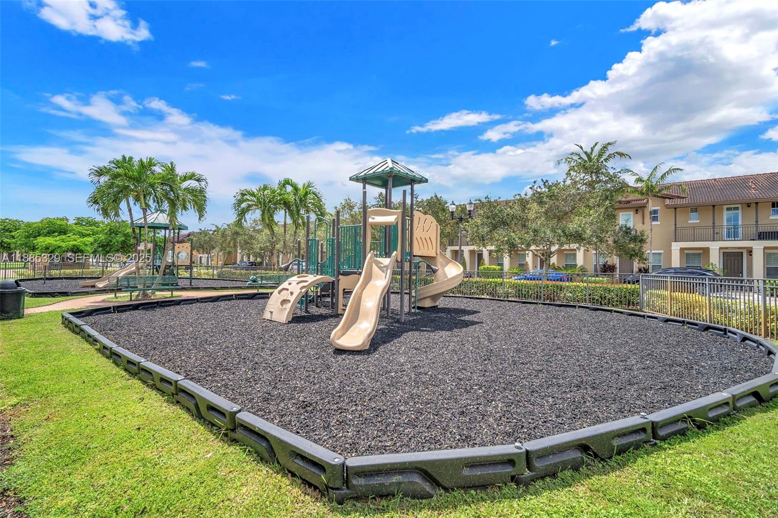 14634 Southwest 5th Street, Unit 15 Pembroke Pines, FL 33027 - Photo 44 of 56 a view of outdoor space yard deck patio and fire pit