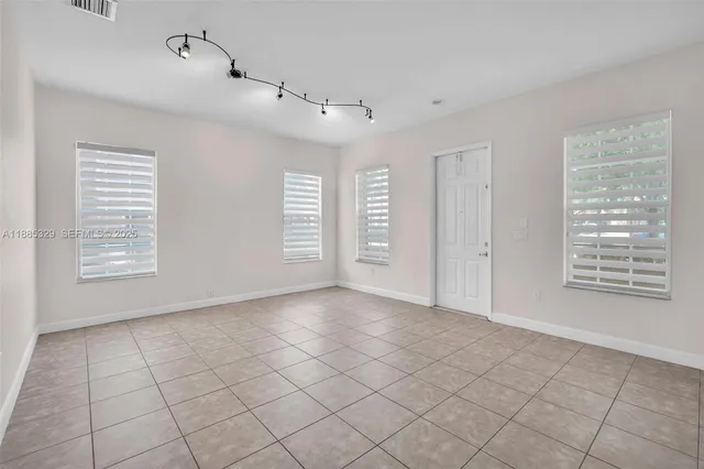 an empty room with windows