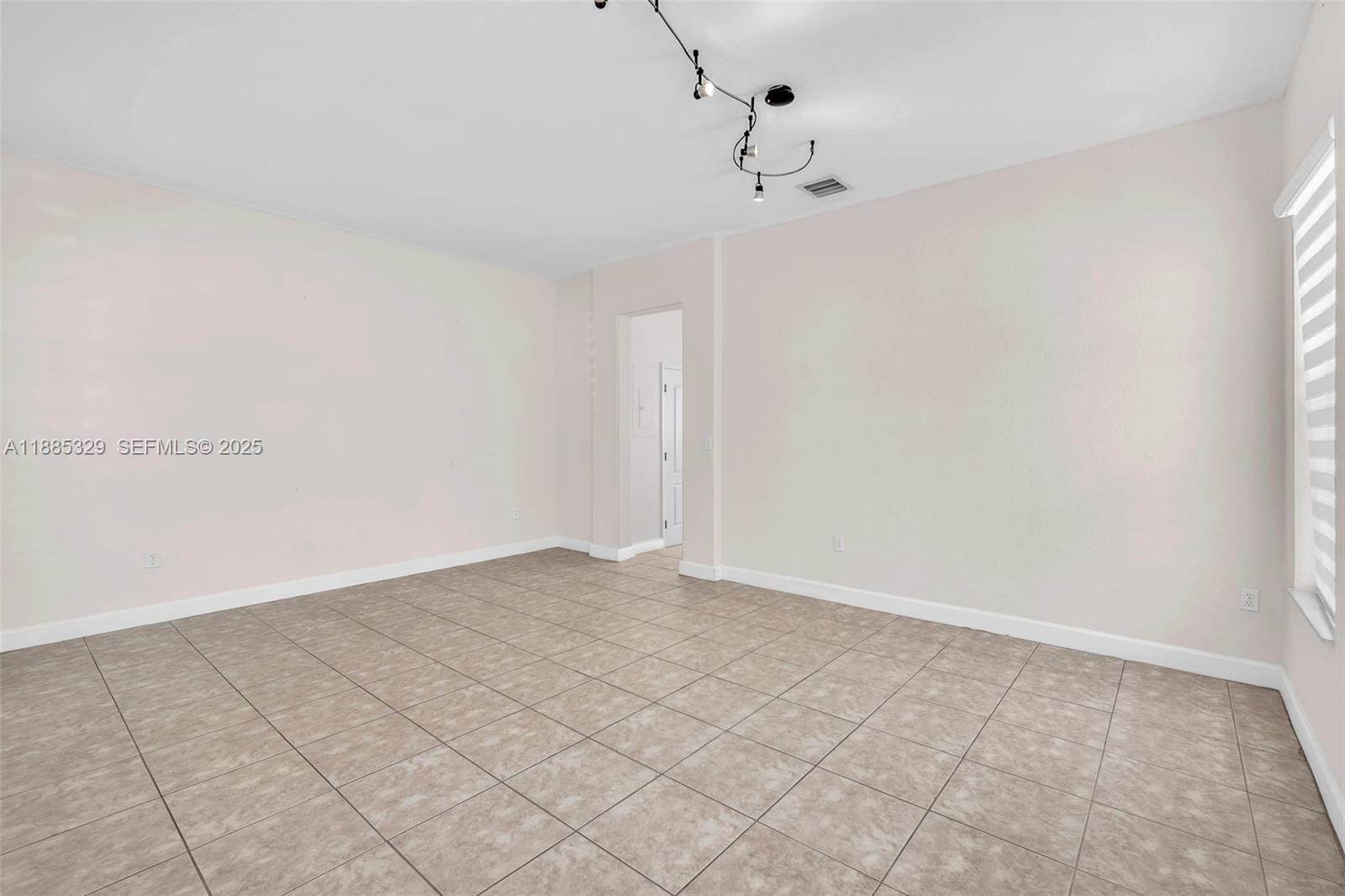 14634 Southwest 5th Street, Unit 15 Pembroke Pines, FL 33027 - Photo 8 of 56 a view of an empty room
