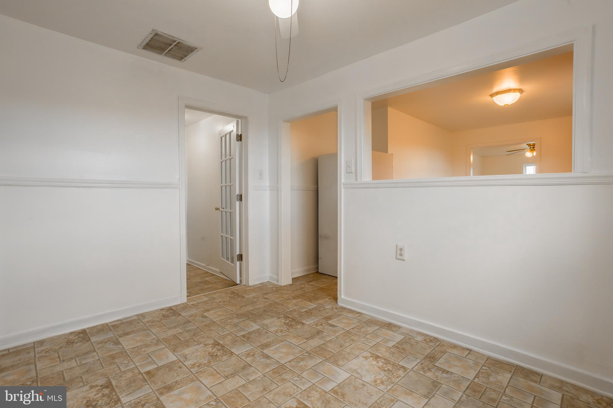 8952 Cannon Road Bridgeville, DE 19933 - Photo 12 of 29 a view of an empty room with window and bathroom