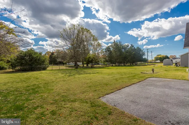 a view of a house with a big yard