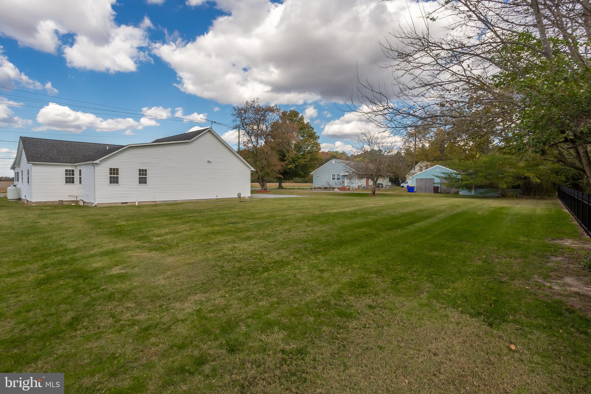 8952 Cannon Road Bridgeville, DE 19933 - Photo 29 of 29 a front view of house with yard and trees