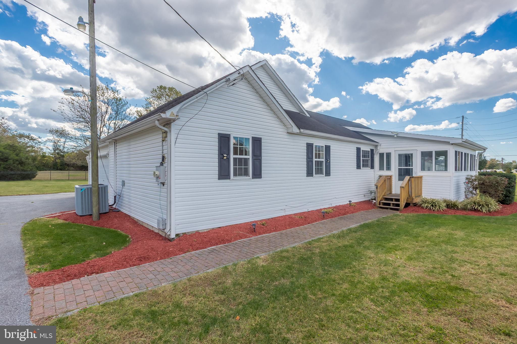8952 Cannon Road Bridgeville, DE 19933 - Photo 4 of 29 a view of backyard with a patio