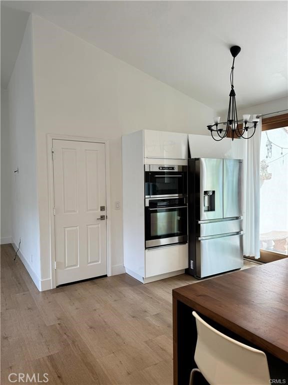 15 Marsala Irvine, CA 92606 - Photo 11 of 31 a kitchen with a refrigerator and countertop