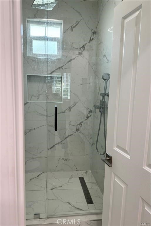 15 Marsala Irvine, CA 92606 - Photo 16 of 31 a bathroom with a shower